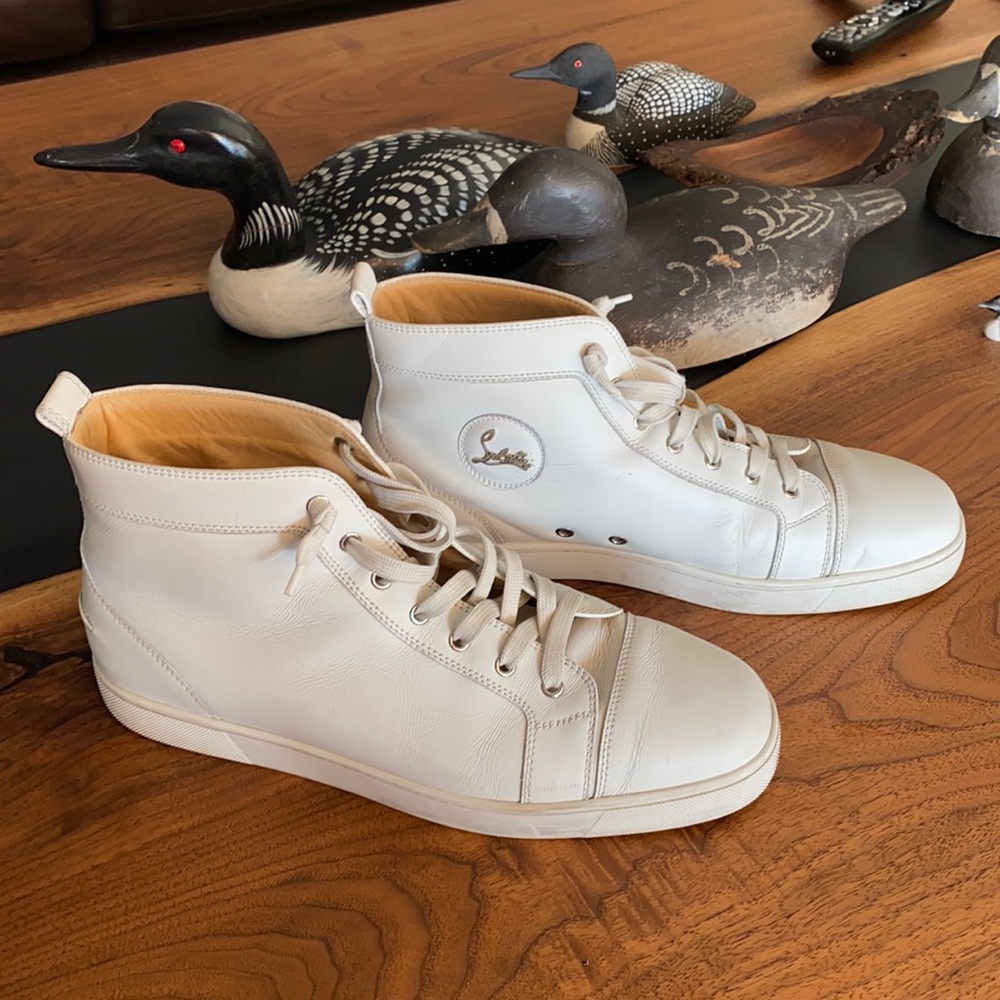 Christian Louboutin high top leather sneakers.